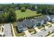 Stunning aerial view of homes with expansive green space and equestrian facilities at 2501 Macedonia Pine Dr, Raleigh, NC 27616