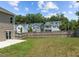 Fenced backyard with lush green grass and a concrete patio, perfect for outdoor activities and relaxation at 2501 Macedonia Pine Dr, Raleigh, NC 27616