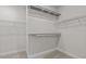 Spacious walk-in closet with wire shelving and rod for organized storage at 2501 Macedonia Pine Dr, Raleigh, NC 27616