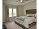 Relaxing main bedroom showcases king bed with decorative pillows and window at 2501 Macedonia Pine Dr, Raleigh, NC 27616