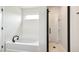 Bright bathroom with separate tub and shower features modern fixtures and a clean design at 2527 Girvan Dr, Fuquay Varina, NC 27526