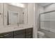 Elegant bathroom showcasing a modern vanity with gold fixtures and a glass-enclosed shower at 260 Pilot Ridge Rd, Zebulon, NC 27597