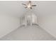Spacious bonus room with neutral carpet, ceiling fan, and a closet space at 260 Pilot Ridge Rd, Zebulon, NC 27597