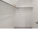 Spacious walk-in closet features shelving and neutral carpet at 260 Pilot Ridge Rd, Zebulon, NC 27597