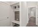 Hallway mudroom boasts built-in cubbies, bench, and decorative wood-look accent paneling for organized storage at 260 Pilot Ridge Rd, Zebulon, NC 27597