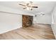 Finished basement with a stone fireplace and luxury vinyl plank floors at 2606 Newquay St, Durham, NC 27705