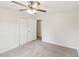 Bedroom featuring neutral carpet and a closet with double doors at 2606 Newquay St, Durham, NC 27705