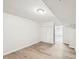 Bedroom featuring vinyl floors and a sliding door closet at 2606 Newquay St, Durham, NC 27705