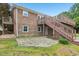 Multi-level brick home with a large patio and deck at 2606 Newquay St, Durham, NC 27705