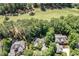 Residential neighborhood with a golf course, lush greenery, and mature trees at 27425 Walker, Chapel Hill, NC 27517