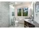 Bathroom featuring granite counter, glass shower and modern toilet at 27425 Walker, Chapel Hill, NC 27517