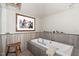 Elegant bathroom with a modern soaking tub and tile surround at 27425 Walker, Chapel Hill, NC 27517