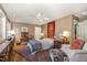 Cozy bedroom featuring a ceiling fan, area rug, and eclectic décor at 27425 Walker, Chapel Hill, NC 27517
