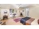 Bedroom featuring a ceiling fan, large window, and small desk at 27425 Walker, Chapel Hill, NC 27517