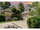 Beautiful home featuring a two-car garage and meticulously maintained landscaping at 27425 Walker, Chapel Hill, NC 27517