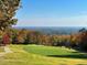 Picturesque golf course with autumn trees and a distant view at 27425 Walker, Chapel Hill, NC 27517
