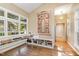 Bright office space features large windows, built-in shelves, and natural light for a productive work environment at 27425 Walker, Chapel Hill, NC 27517