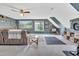 Large bonus room with vaulted ceilings, a comfortable seating area, and carpeted floors at 31 Bucking Saddle Way, Willow Springs, NC 27592