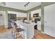 Well-appointed kitchen featuring white cabinetry, a center island, and modern appliances at 31 Bucking Saddle Way, Willow Springs, NC 27592