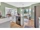 Modern kitchen with a spacious island, stainless steel appliances, and a bay window at 31 Bucking Saddle Way, Willow Springs, NC 27592
