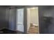 Renovated bathroom with a sliding barn door and tiled walk-in shower at 310 E Woodall St, Smithfield, NC 27577
