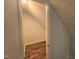 Spacious walk-in closet with wood floors, ample storage space, and natural light at 310 E Woodall St, Smithfield, NC 27577