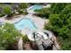 Community pool area with water slide and splash pad features for Gathering enjoyment at 312 Bridgegate Dr, Cary, NC 27519