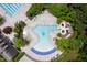 Aerial view of community pools with a water slide, splash pad, and swimming lanes at 312 Bridgegate Dr, Cary, NC 27519