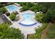 Aerial view of community pools with a recreational pool, swimming lanes, and ample seating at 312 Bridgegate Dr, Cary, NC 27519