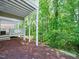 Exterior view of back yard and wooded area at 312 Bridgegate Dr, Cary, NC 27519