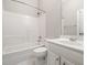 Bright bathroom featuring shower over tub and vanity with sink at 312 Bridgegate Dr, Cary, NC 27519