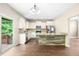 Bright, open kitchen with stainless steel appliances and a wooden island at 317 Chamberlain Dr, Clayton, NC 27527