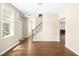 Open-concept living space with hardwood floors and abundant natural light at 317 Chamberlain Dr, Clayton, NC 27527