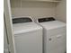 Laundry room featuring a Whirlpool washer and dryer at 3300 Neuse Crossing Dr, Raleigh, NC 27616
