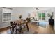 Cozy living room with natural light and a walkout balcony at 34 Johnston St, Pittsboro, NC 27312
