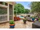 Backyard with pool, patio, landscaped borders and screened-in porch at 3821 Falls River Ave, Raleigh, NC 27614