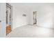 A bedroom with an attached bathroom and a mounted television bracket at 3821 Falls River Ave, Raleigh, NC 27614