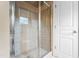 Tiled glass shower enclosure at 3821 Falls River Ave, Raleigh, NC 27614