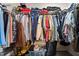 Walk-in closet with ample space for clothing and storage; includes shelving and hanging racks at 4022 Avents Ferry Rd, Sanford, NC 27330