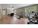 Inviting living area with hardwood floors, a ceiling fan, and natural light at 4022 Avents Ferry Rd, Sanford, NC 27330