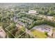 Aerial view showcasing property near W Chatham St, surrounded by trees and proximity to the parking area at 414 Madison Ave, Cary, NC 27513