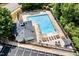 Aerial view of pool area with cabana, chairs and parking at 430 Dogwood Creek Pl, Fuquay Varina, NC 27526