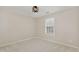 An empty bedroom with neutral paint, carpet, and one window at 430 Dogwood Creek Pl, Fuquay Varina, NC 27526