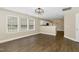 Bright living room featuring hardwood floors, neutral paint, and large windows with views at 430 Dogwood Creek Pl, Fuquay Varina, NC 27526