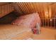 Unfinished attic space with exposed rafters, insulation, and electrical, offering customization options at 4667 Freedom Dr, Burlington, NC 27215