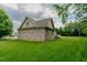 Charming brick home with a spacious backyard and a lovely deck at 4667 Freedom Dr, Burlington, NC 27215
