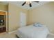 Comfortable bedroom featuring neutral decor, a ceiling fan, and carpeted floors at 4667 Freedom Dr, Burlington, NC 27215