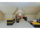 Unfinished bonus room offers versatility and potential for customization, with a window and storage space at 4667 Freedom Dr, Burlington, NC 27215