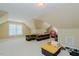 Spacious bonus room provides flexible living space, with natural light and room for various activities at 4667 Freedom Dr, Burlington, NC 27215