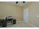 Cozy office space features neutral decor with white trim, and a ceiling fan at 4667 Freedom Dr, Burlington, NC 27215